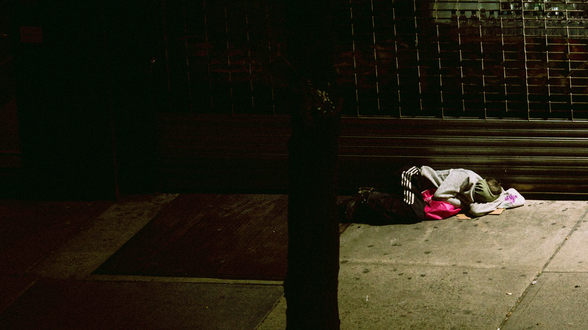 Homeless person sleeping on street