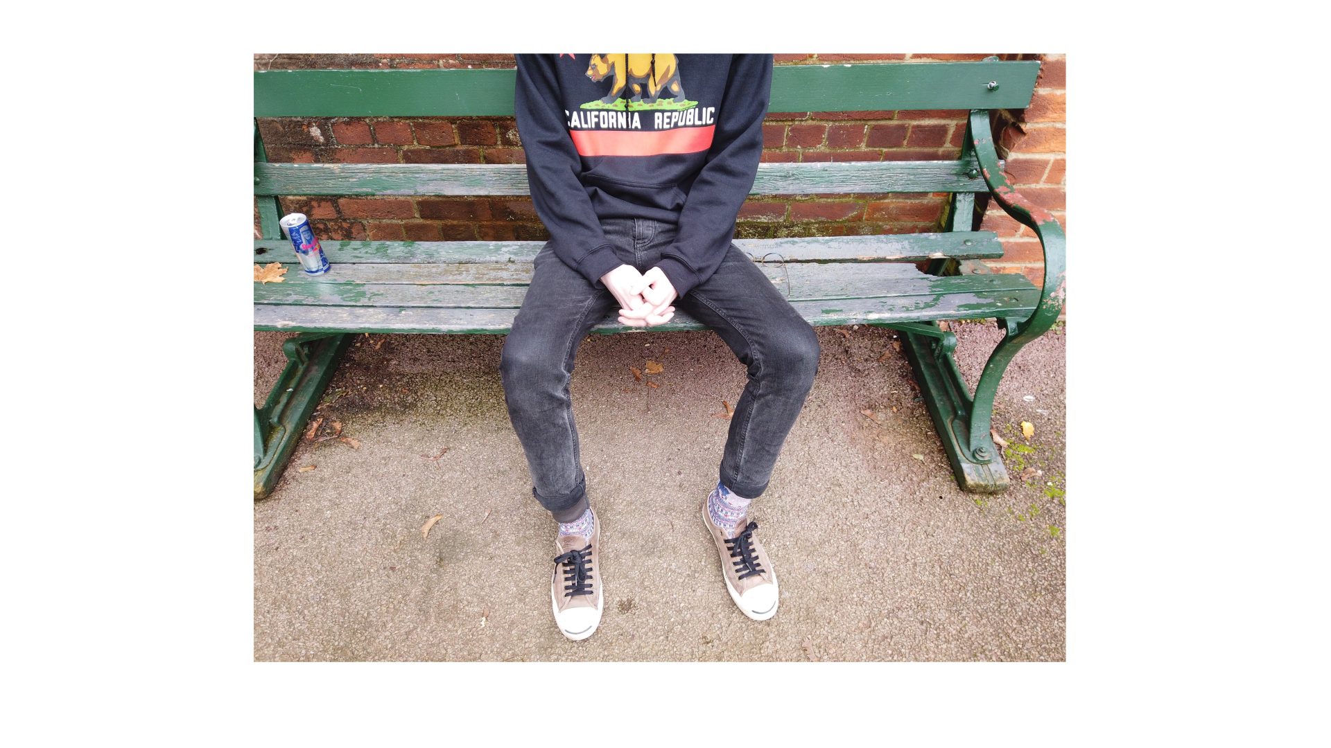 Picture of a person sitting on a bench