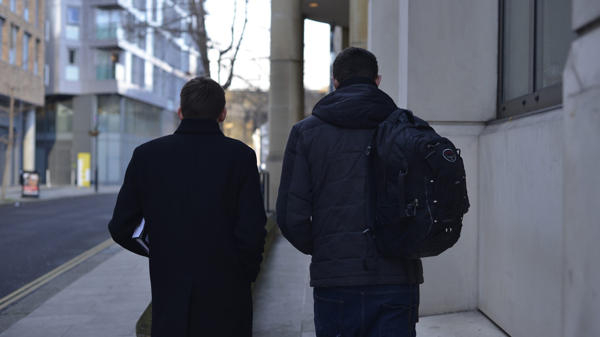 Two service users walking