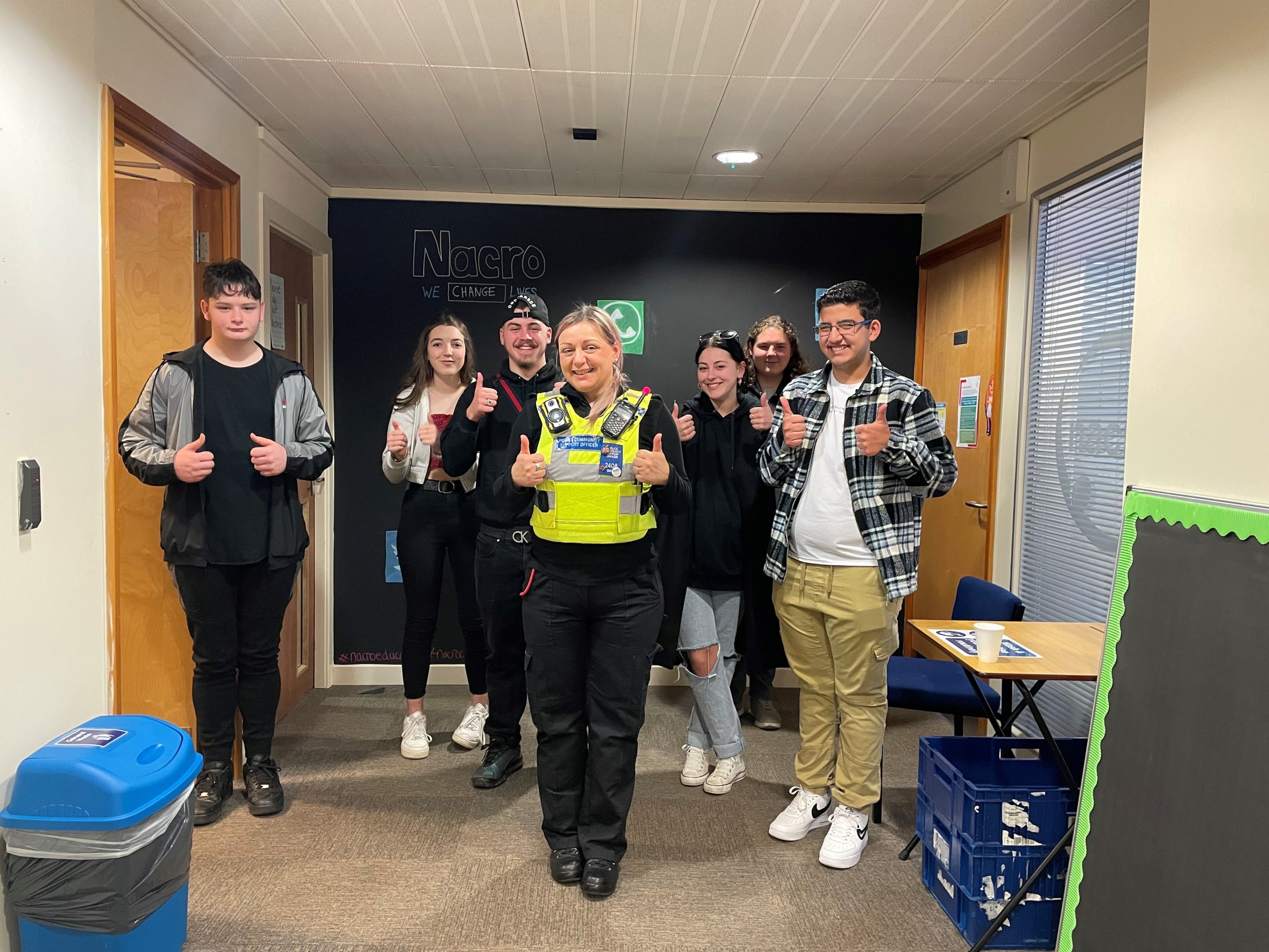 Learners with police officer during visit to Nacro Education Spalding