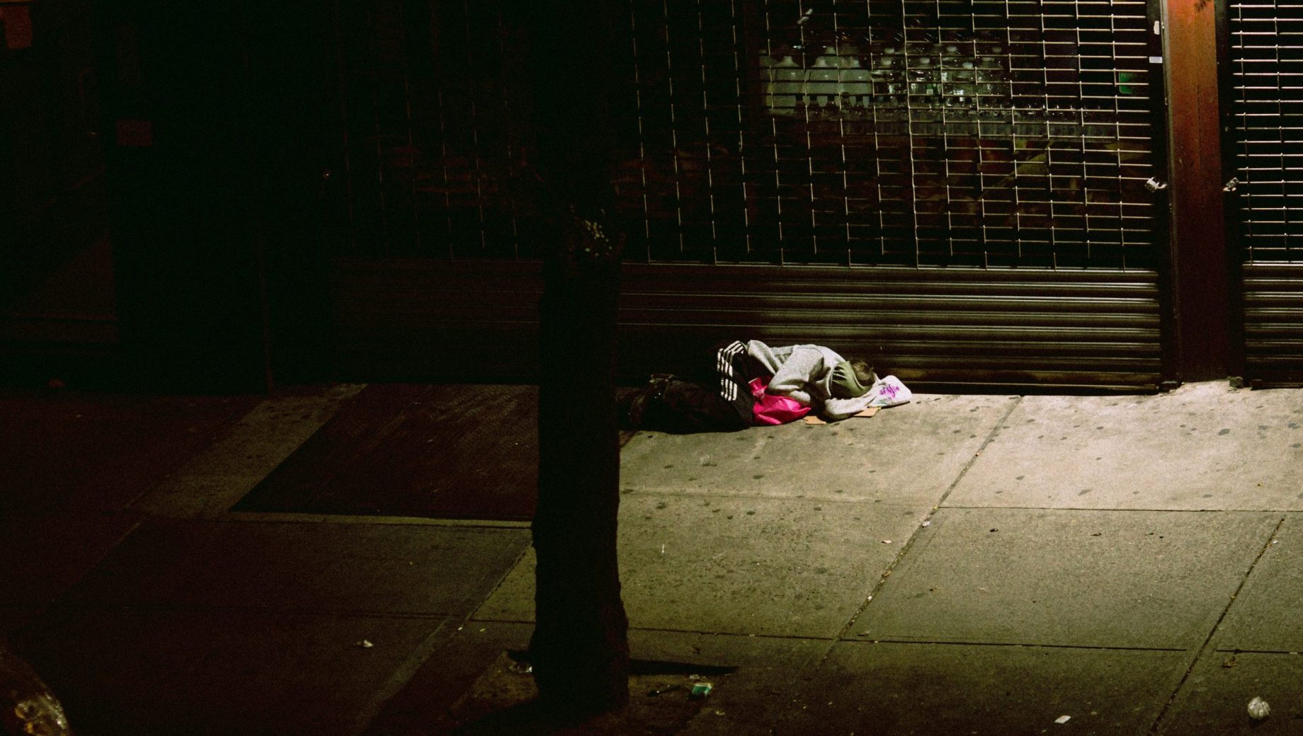 Homeless person sleeping on the street