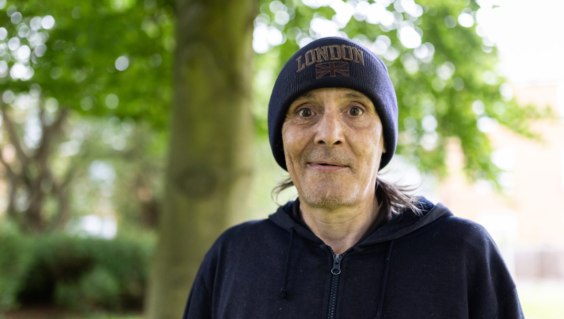image of service user in wooly hat