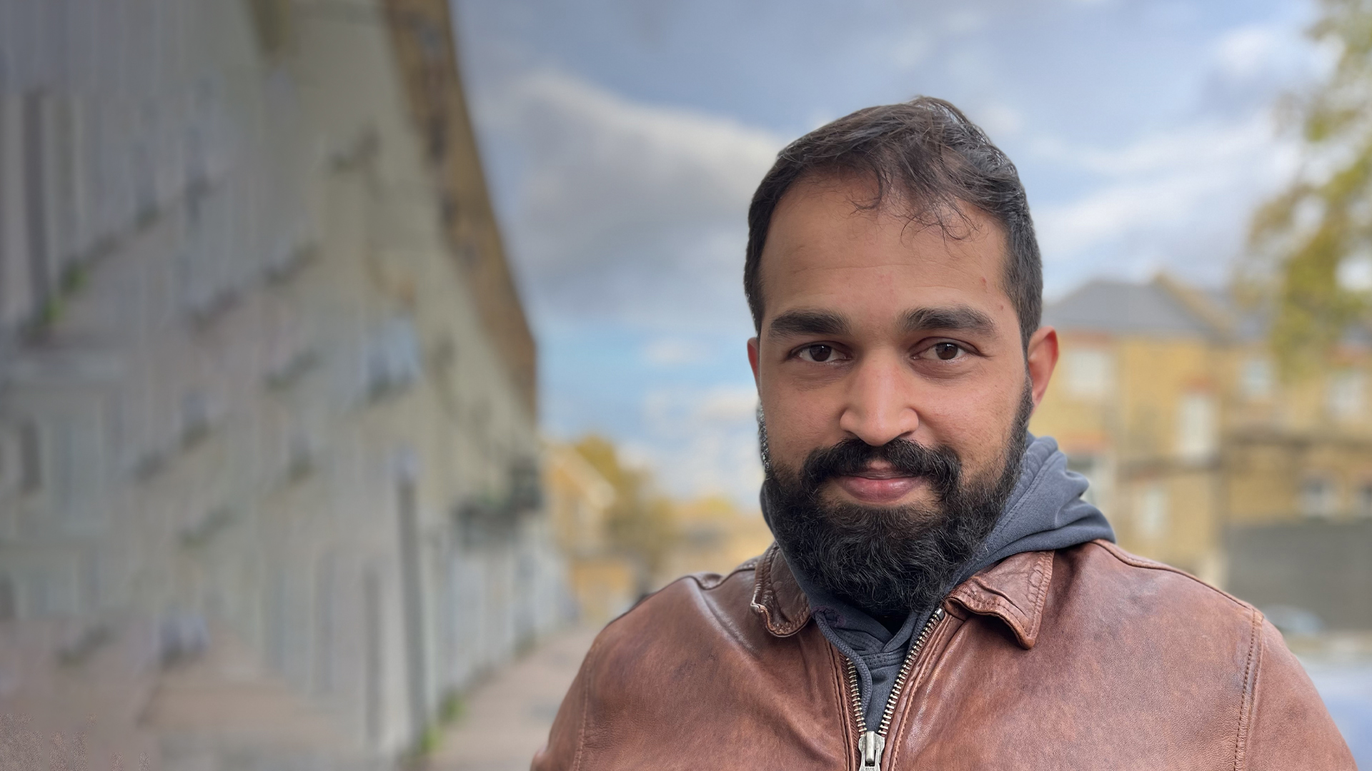 image of a man with a beard , donations page