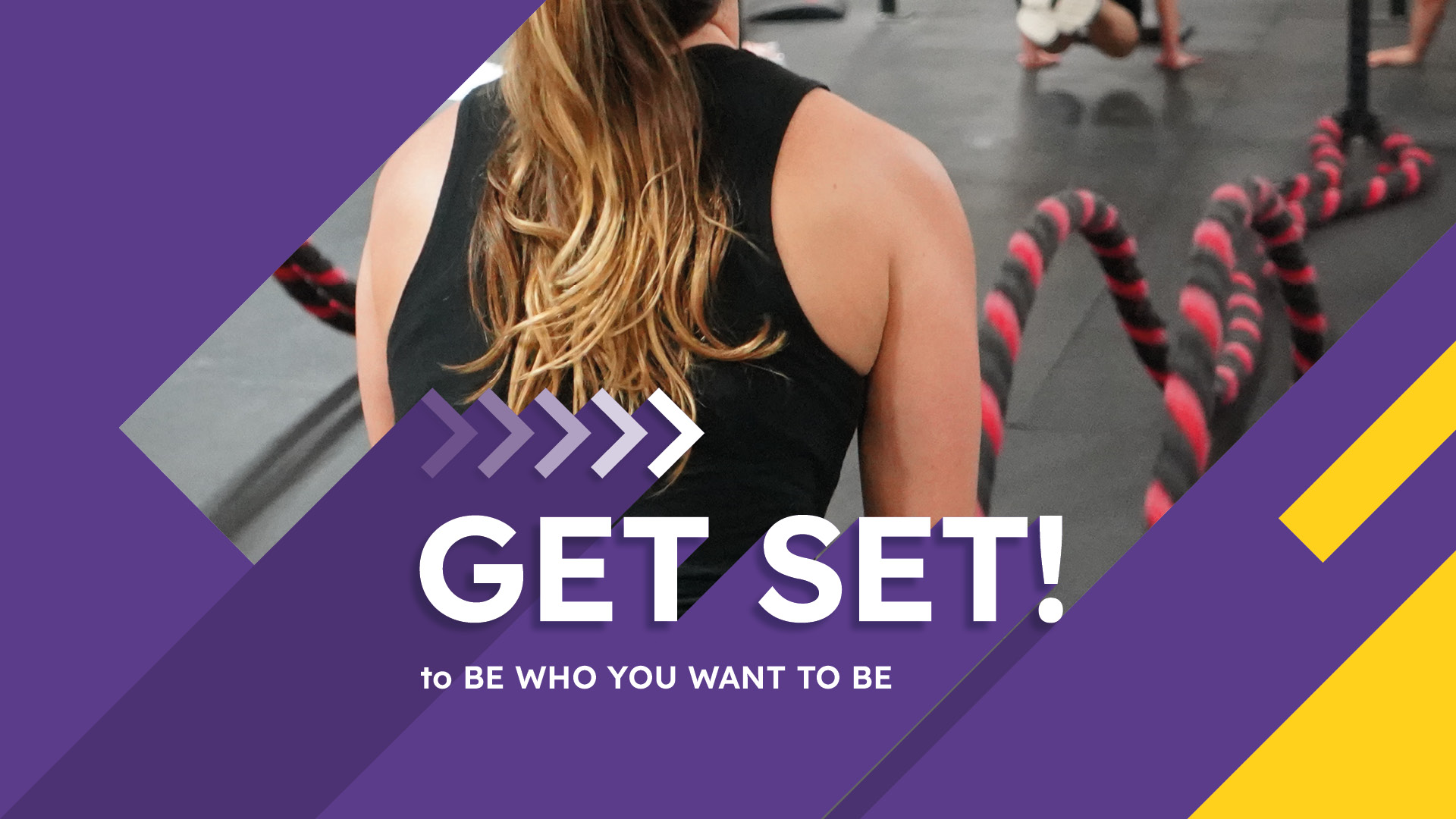 Photo of person in the gym training with ropes