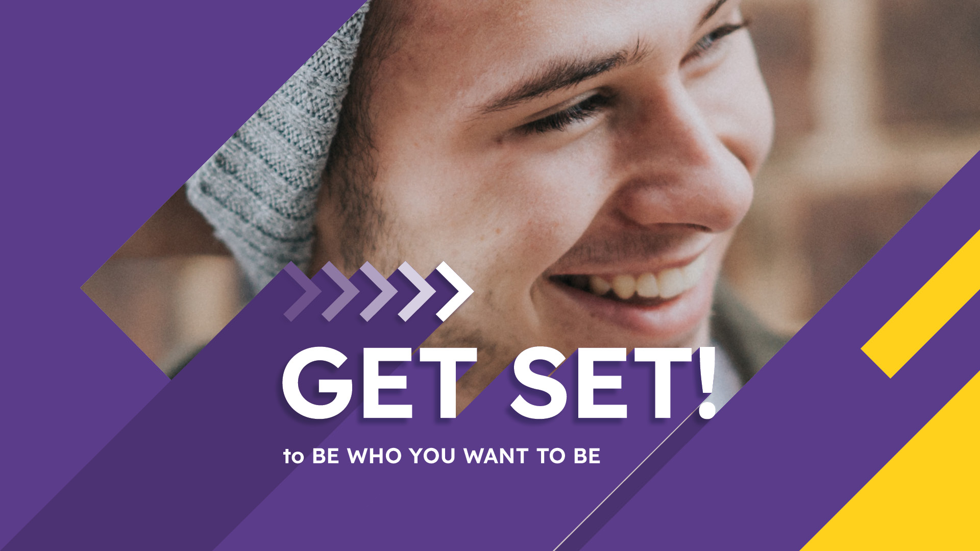 Image of smiling young student looking at camera