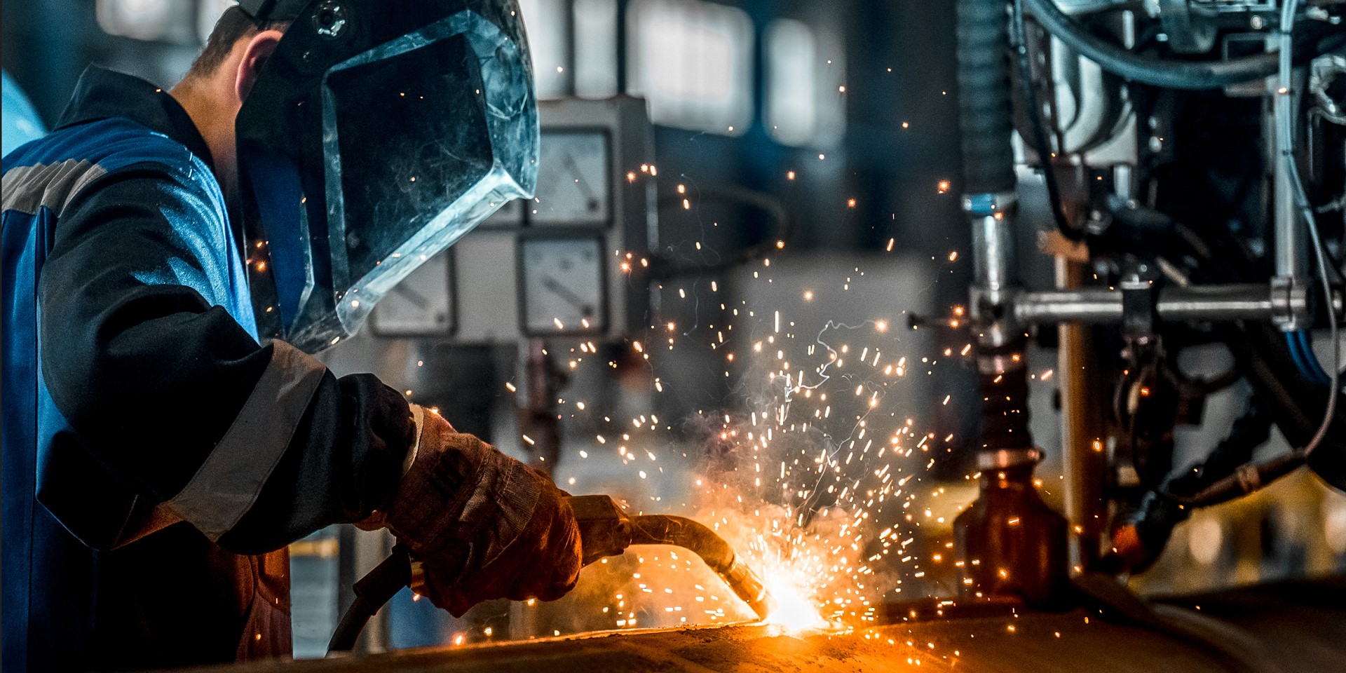 Person doing metal welding
