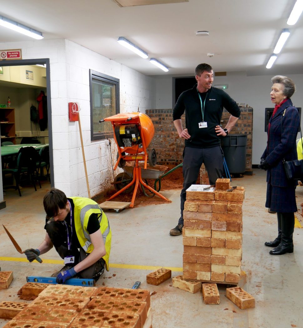 Construction students at Nacro Education, being visited by the Princess Royal.